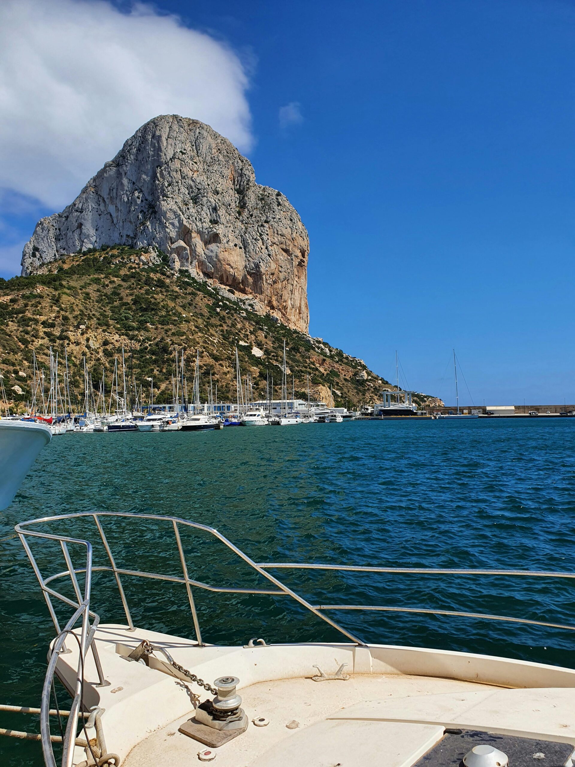 Explore the stunning coastline and marina at Calpe with iconic Peñón de Ifach.